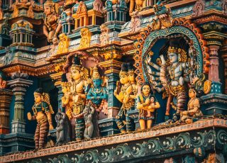gold and blue hindu deity statue
